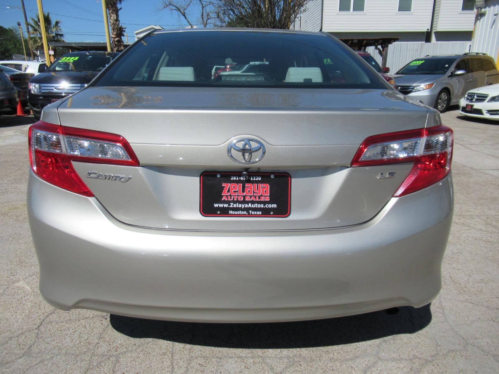 2014 /Tan Toyota Camry L (4T4BF1FK2ER) with an 2.5L L4 DOHC 16V engine, Automatic transmission, located at 1511 North Shepherd Dr., Houston, TX, 77008, (281) 657-1221, 29.798361, -95.412560 - 2014 TOYOTA CAMRY LE VIN: 4T4BF1FK2ER364962 4 T 4 B F 1 F K 2 E R 3 6 4 9 6 2 SEDAN 4 DR 2.5L I4 F DOHC 16V GASOLINE FRONT WHEEL DRIVE - Photo #16